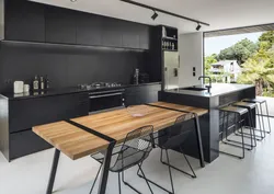 Kitchen with black table photo