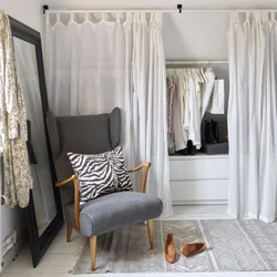 Dressing room with curtains instead of doors in the bedroom photo