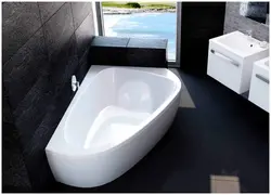 Photo Of Asymmetrical Bathtubs In The Bathroom