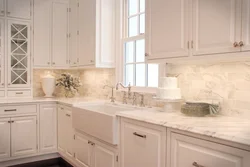 Countertops and wall panels for white kitchen photo