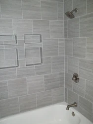 Grouting tiles in the bathroom photo