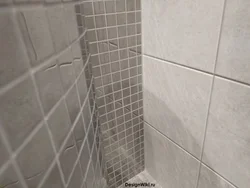 Grouting Tiles In The Bathroom Photo