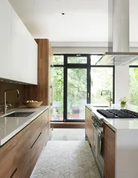 Kitchen design with panoramic windows in a modern style photo