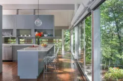 Kitchen design with panoramic windows in a modern style photo