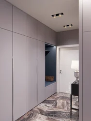 Gray wardrobe in the hallway design