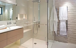 Bathroom design with bath and shower on one wall