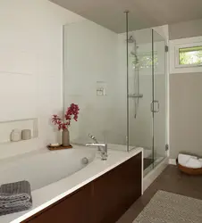 Bathroom design with bath and shower on one wall