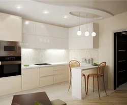 Beige kitchen design with black splashback