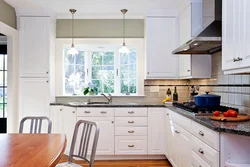 Photo of a kitchen in a house with one window