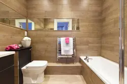 Laminate flooring in the bathroom photo on the wall