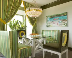 White kitchen interior with green curtains