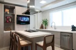 Kitchen living room with TV on the wall photo