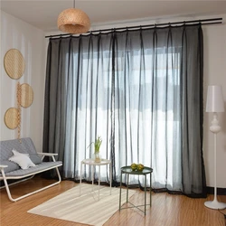Window design in the living room curtains and tulle photo