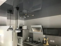 Gray ceiling in the kitchen interior