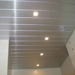 Ceiling design with panels in the bathroom