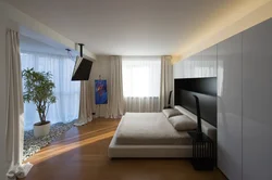 Дизайн спальни в угловой комнате фото