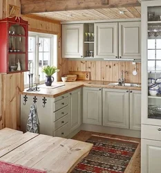 Kitchen design in a small wooden house