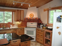 Kitchen design in a small wooden house