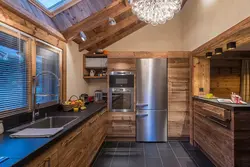 Kitchen design in a small wooden house