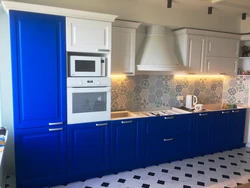 Kitchen interior with white top and blue bottom