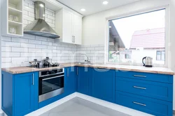 Kitchen interior with white top and blue bottom