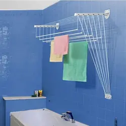 Clothes dryer in the bathroom interior