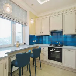 Kitchen interior with blue apron