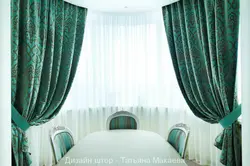 Emerald curtains in the kitchen interior