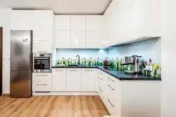 White kitchens in a modern style glossy corner photo