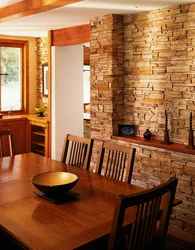 Finishing the kitchen with stone and wallpaper photo