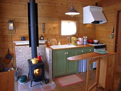 Kitchen layout in a house with a stove photo