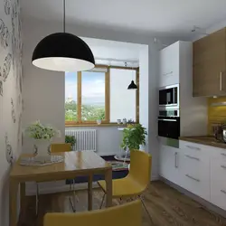 Photo of a square kitchen with a balcony