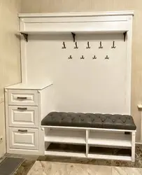 Photo of shoe cabinets with seats in the hallway