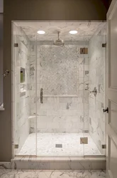 Bathroom design with shower and toilet in marble