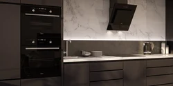 White kitchen design with black appliances