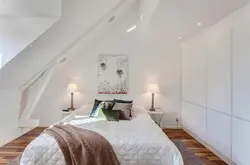 Photo of a bedroom with a sloping ceiling photo