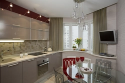 Kitchen with bay window in two-room apartment design photo