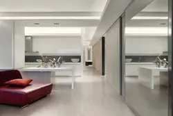 White interior kitchen with living room with porcelain stoneware