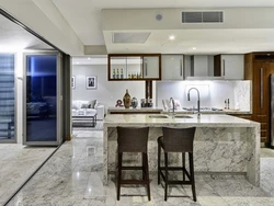 White interior kitchen with living room with porcelain stoneware