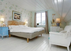 Interior of a wooden bedroom in light colors