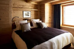 Photo of a bedroom in a wooden style photo