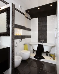 Black mosaic tiles in the bathroom photo