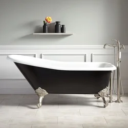 Cast iron bathtub in the bathroom interior