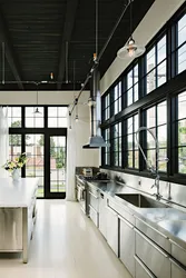 Photo of a kitchen with a loft style window