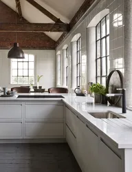 Photo of a kitchen with a loft style window