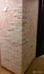 Plaster bricks in the hallway photo