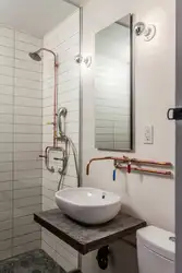 Pipes in the bathroom design photo