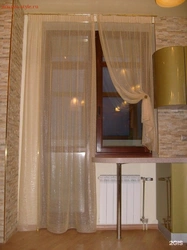 Kitchen design curtains on the door windows