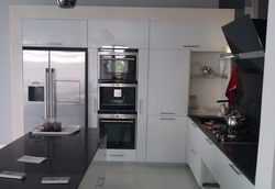 Kitchen With Gray Refrigerator Photo