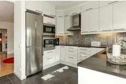 Kitchen With Gray Refrigerator Photo